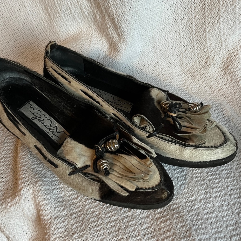 Rare glacee cowhide loafer with fringe and silver beads made in Spain size 8.5